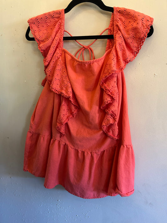 Sofia Vergara Coral ruffle top tie back